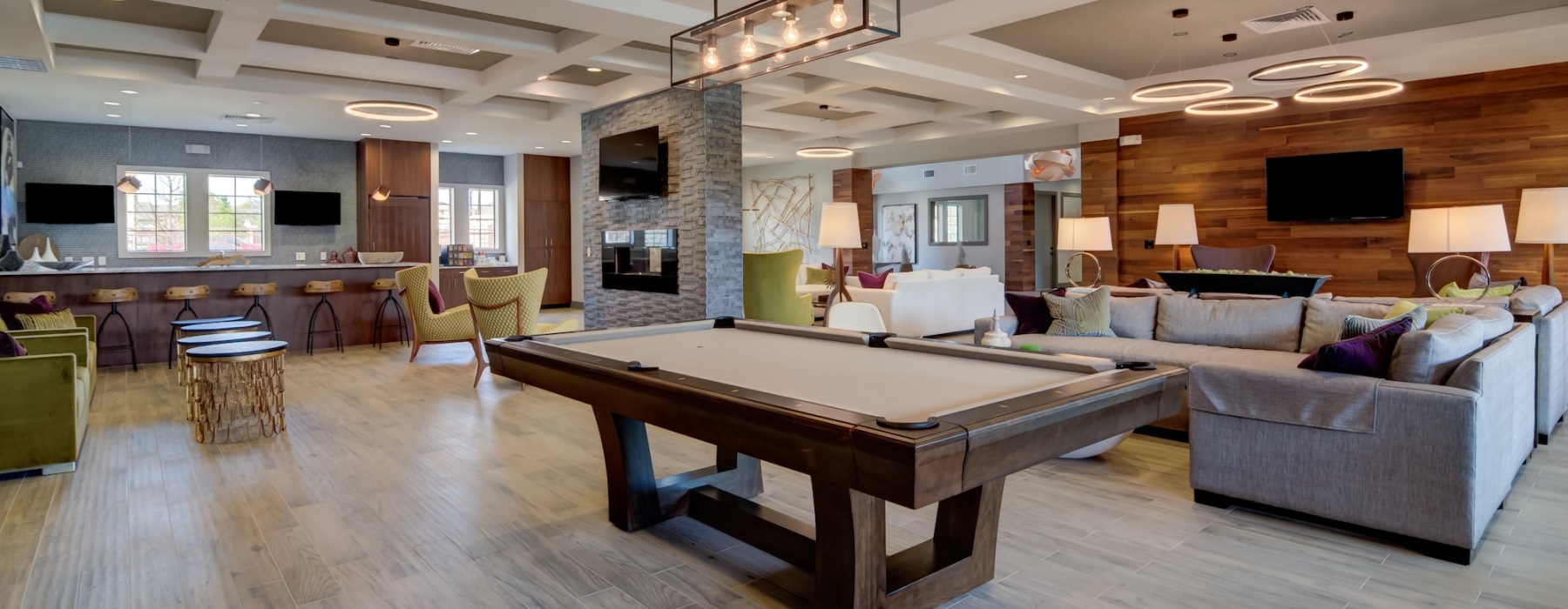 Beautiful clubroom with lounge seating and billiards area