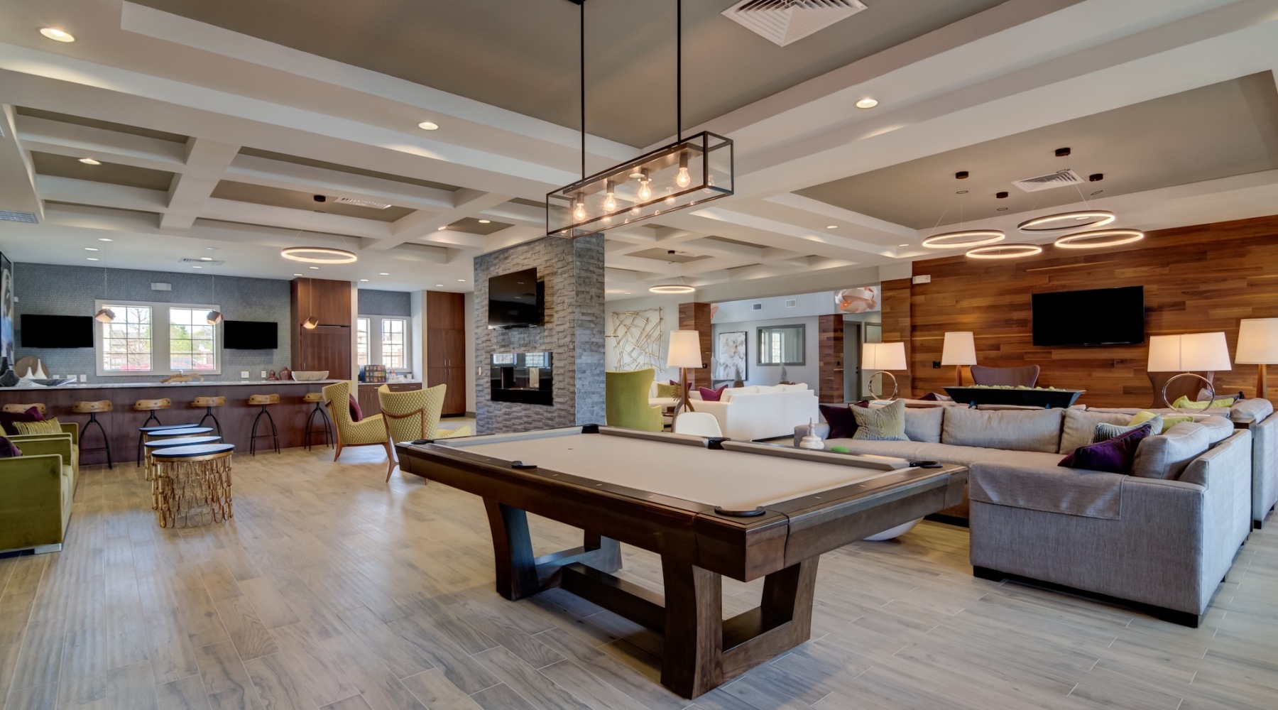 Beautiful clubroom with lounge seating and billiards area