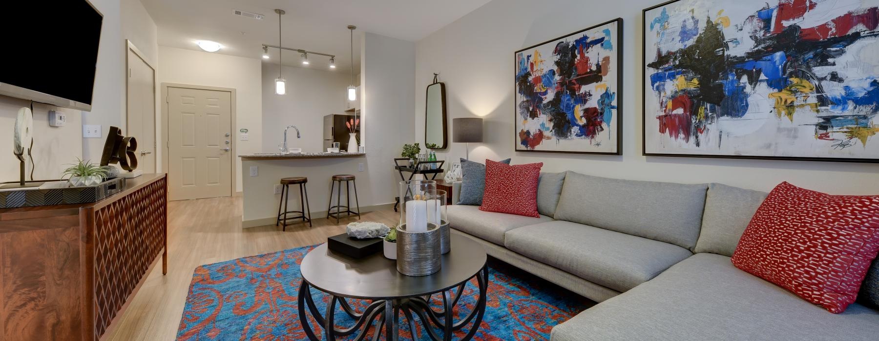a living room with a large rug