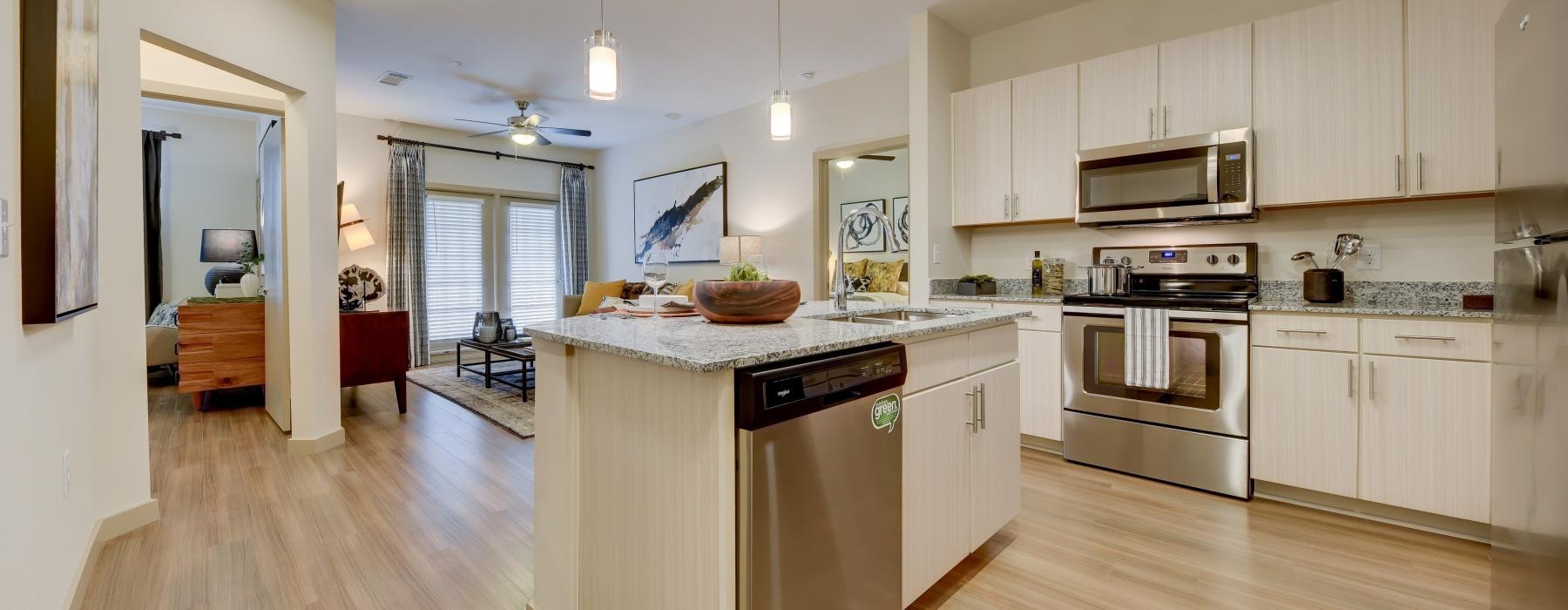 a kitchen with white cabinets