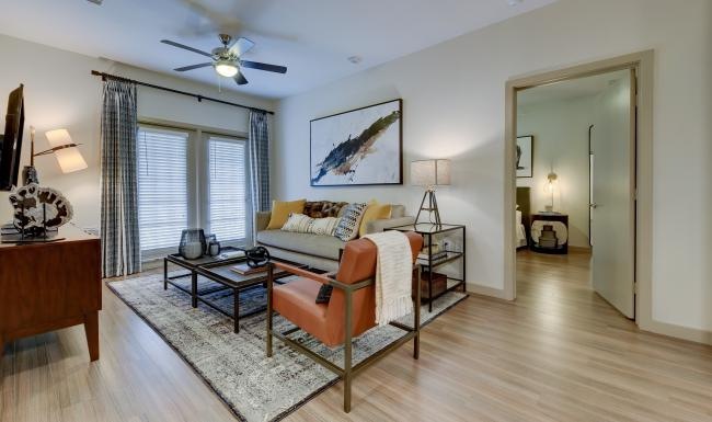 a living room with a large mirror